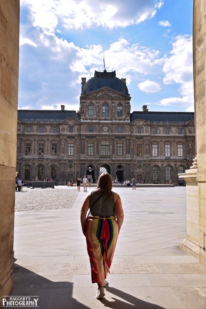 Me walking towards the Louvre in Paris, France. Photo by Haggerty Photography.